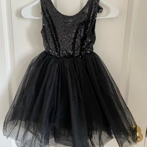 Black dress with sequins on top half